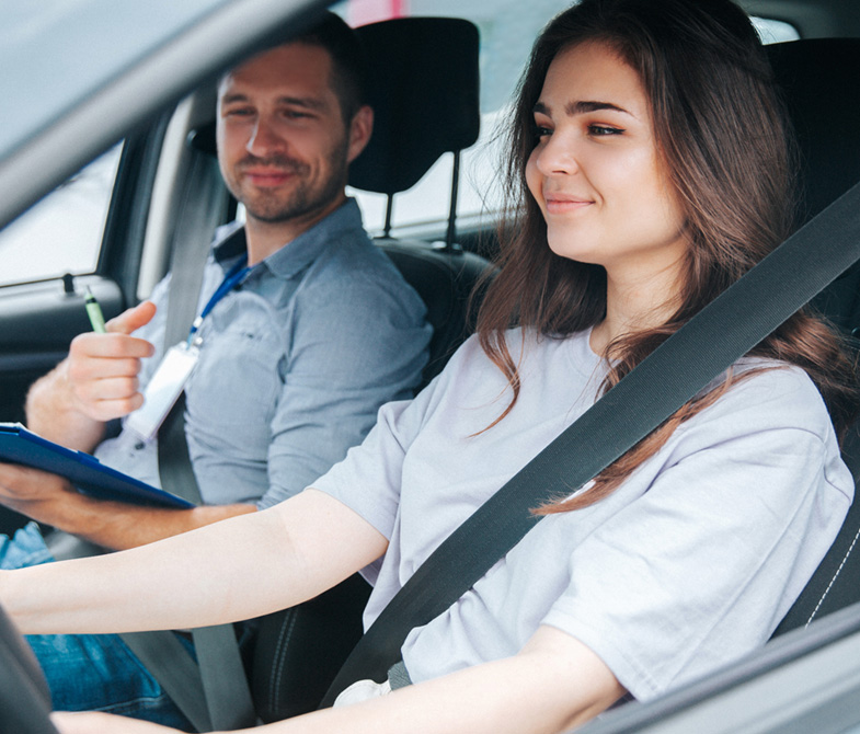 Driving instructor teaching a learner driver